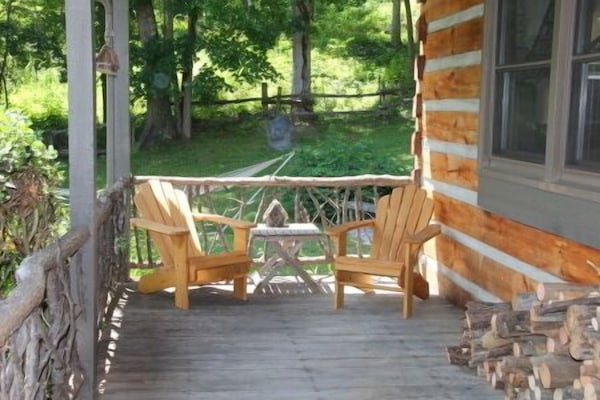 Plenty of space of the large front porch to enjoy the tranquility!