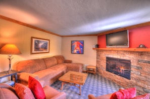 Flat-screen TV, fireplace