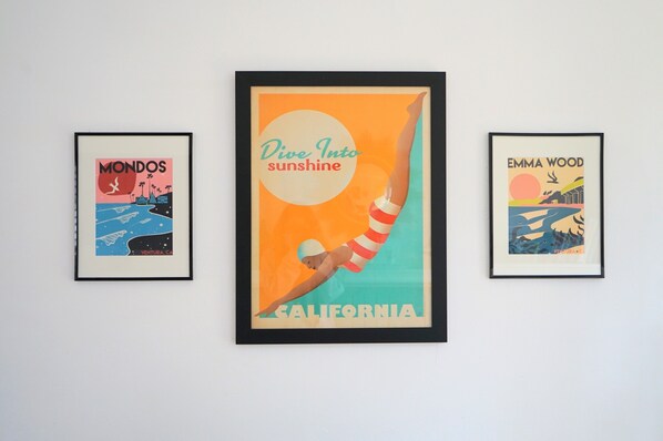 Three framed posters on a wall. - Charming Beach Bungalow in Midtown ++ (Ventura)
