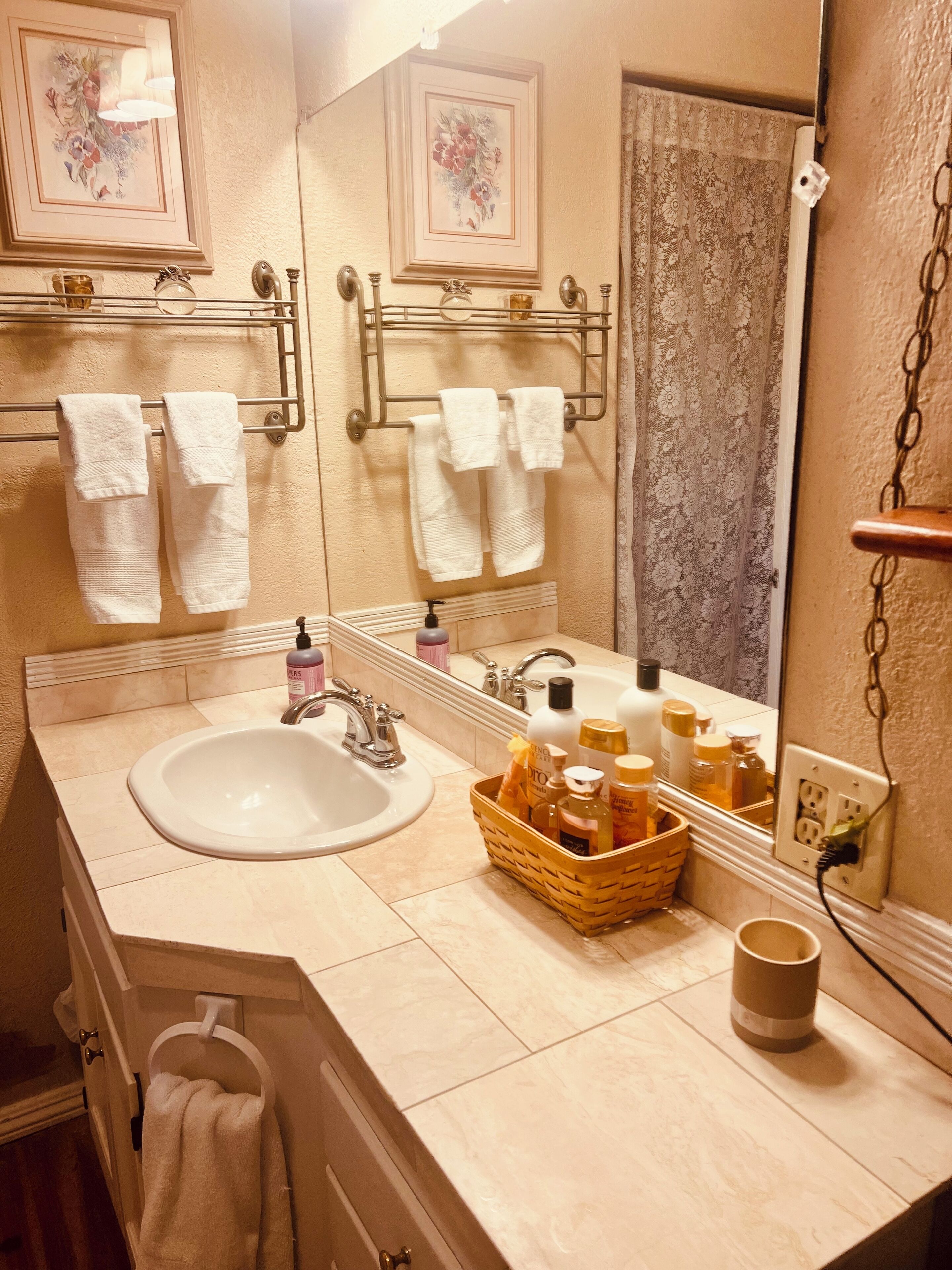 Combined shower/bathtub, hair dryer, towels, soap