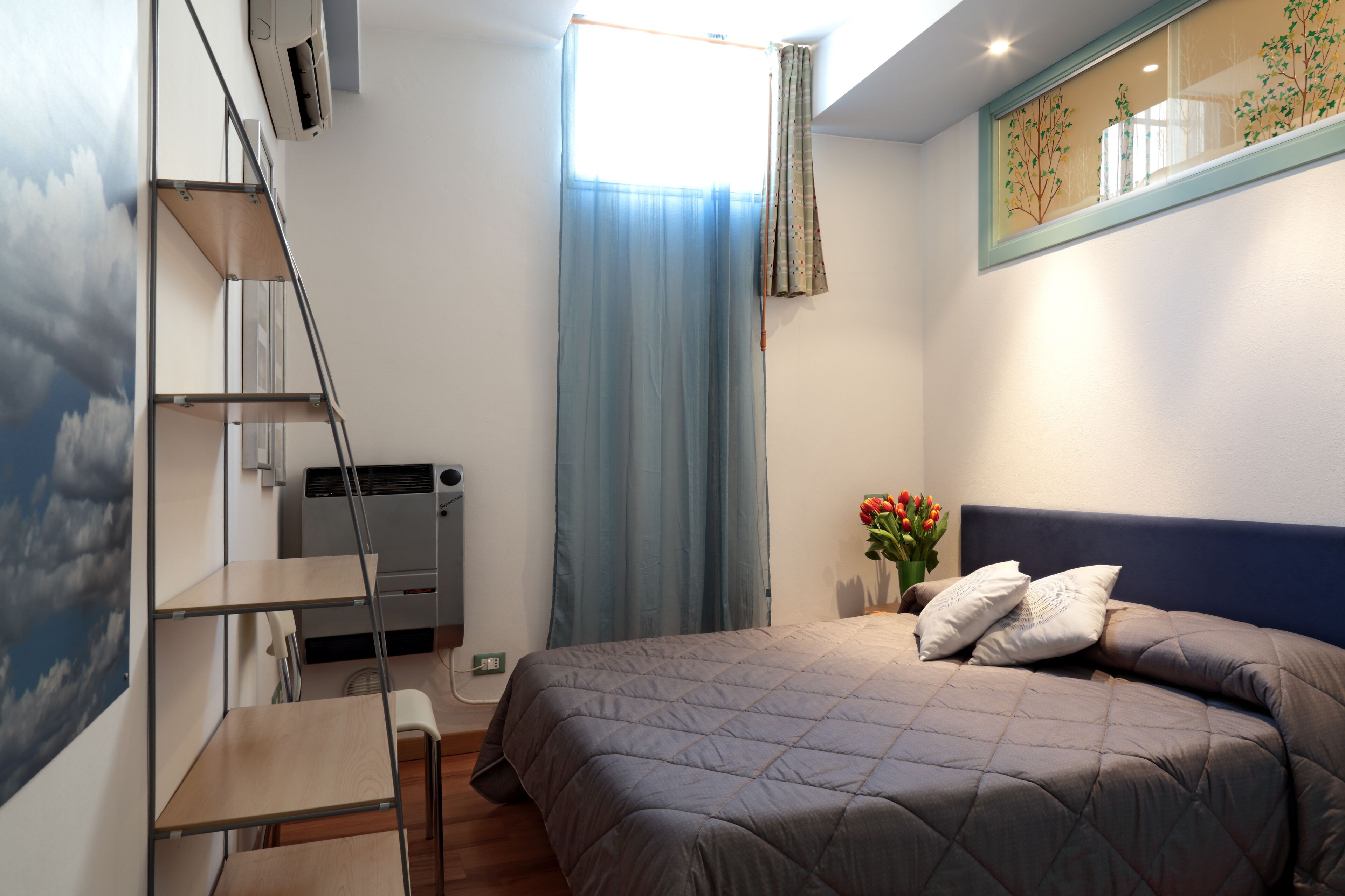 2 bedrooms, desk, iron/ironing board, travel crib