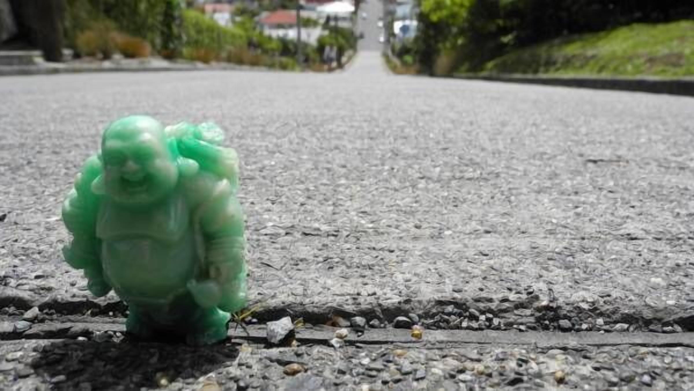 A green object on a road.