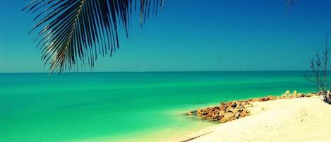 Sun loungers, beach umbrellas, beach towels