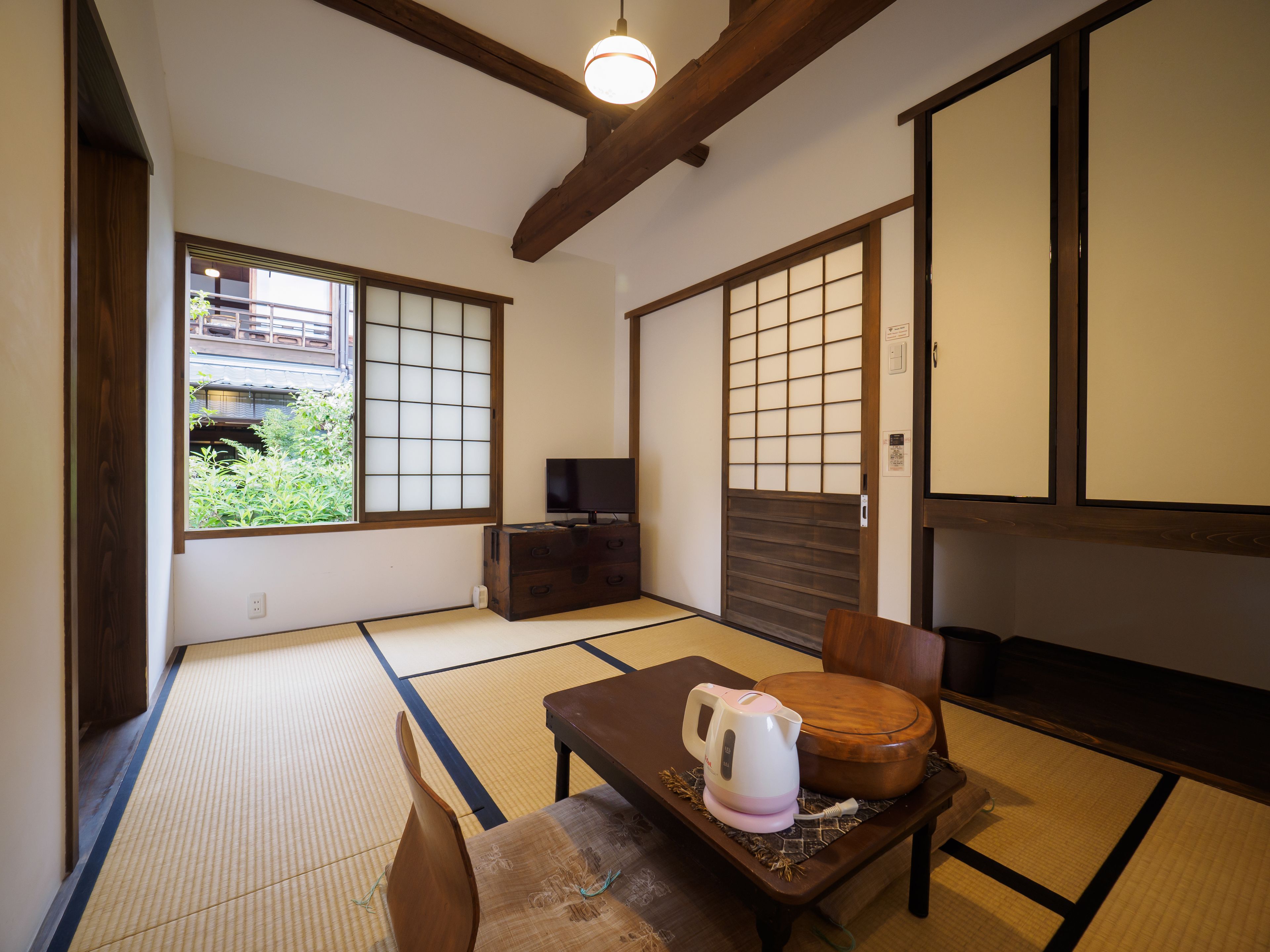 japanese western room, private bathroom | 1 bedroom, in-room safe, free wifi, bed sheets