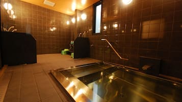 Separate tub and shower, hair dryer, slippers, towels