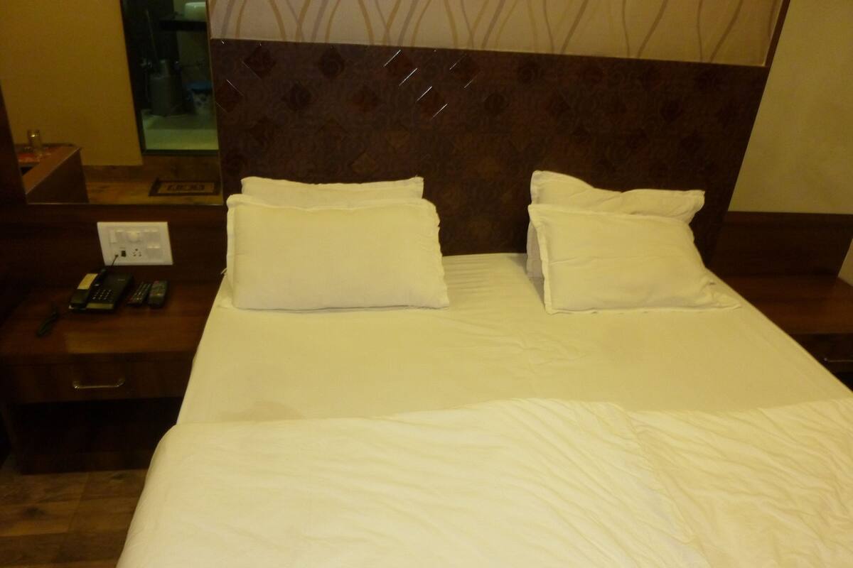 Premium bedding, memory foam beds, in-room safe, desk