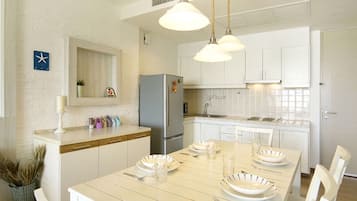 2 Bedroom Apartment | Private kitchen | Full-sized fridge, microwave, stovetop, coffee/tea maker