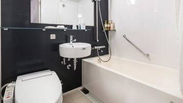 Combined shower/bathtub, free toiletries, hair dryer, slippers