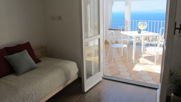 Chambre Double Panoramique, 2 chambres, non-fumeur, vue mer | Coin séjour