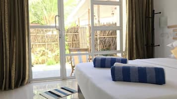 Superior Room, 1 Queen Bed, Patio, Garden View | 1 bedroom, minibar, in-room safe, iron/ironing board