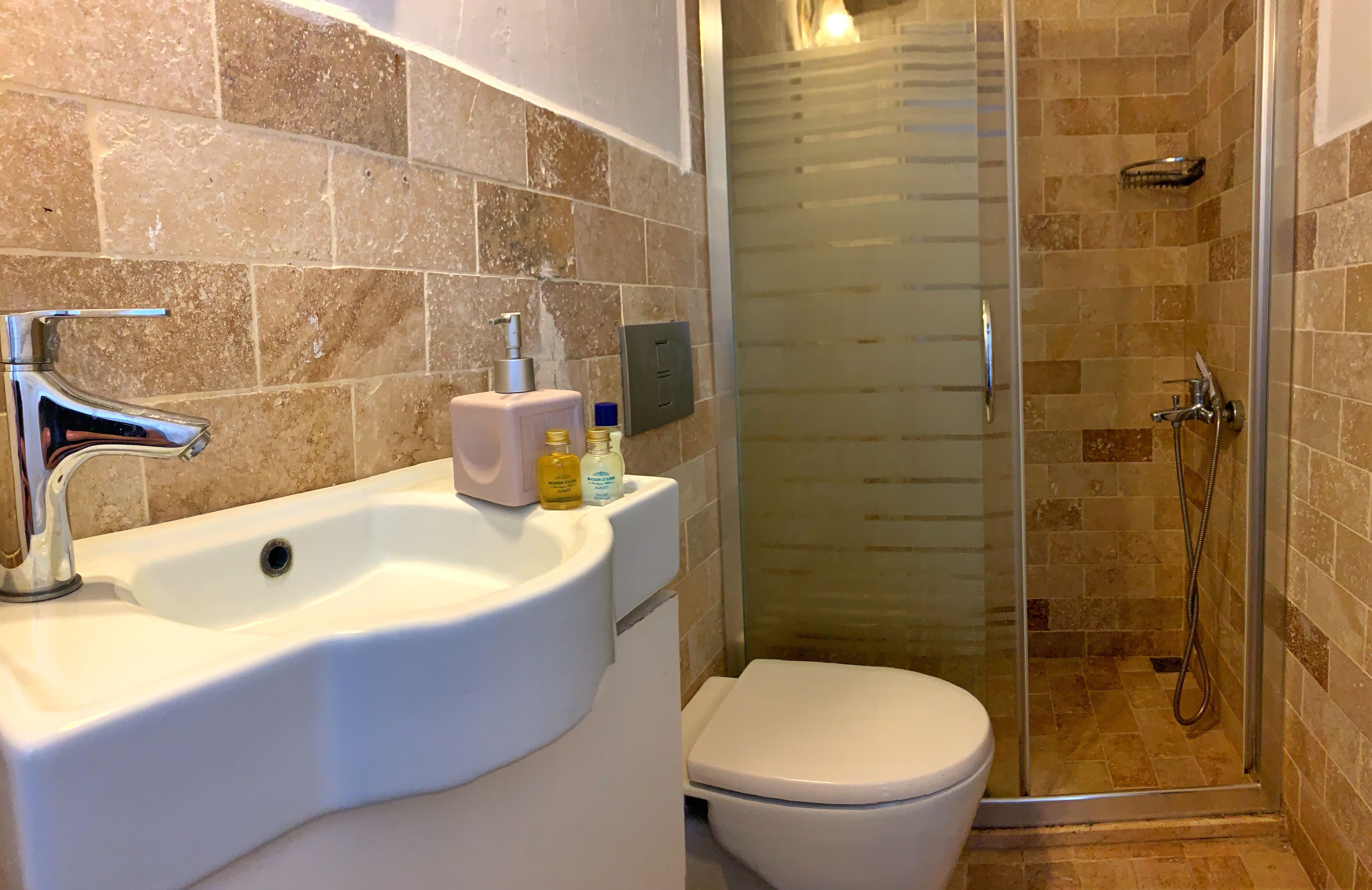 superior triple room | bathroom | shower, free toiletries, hair dryer, slippers