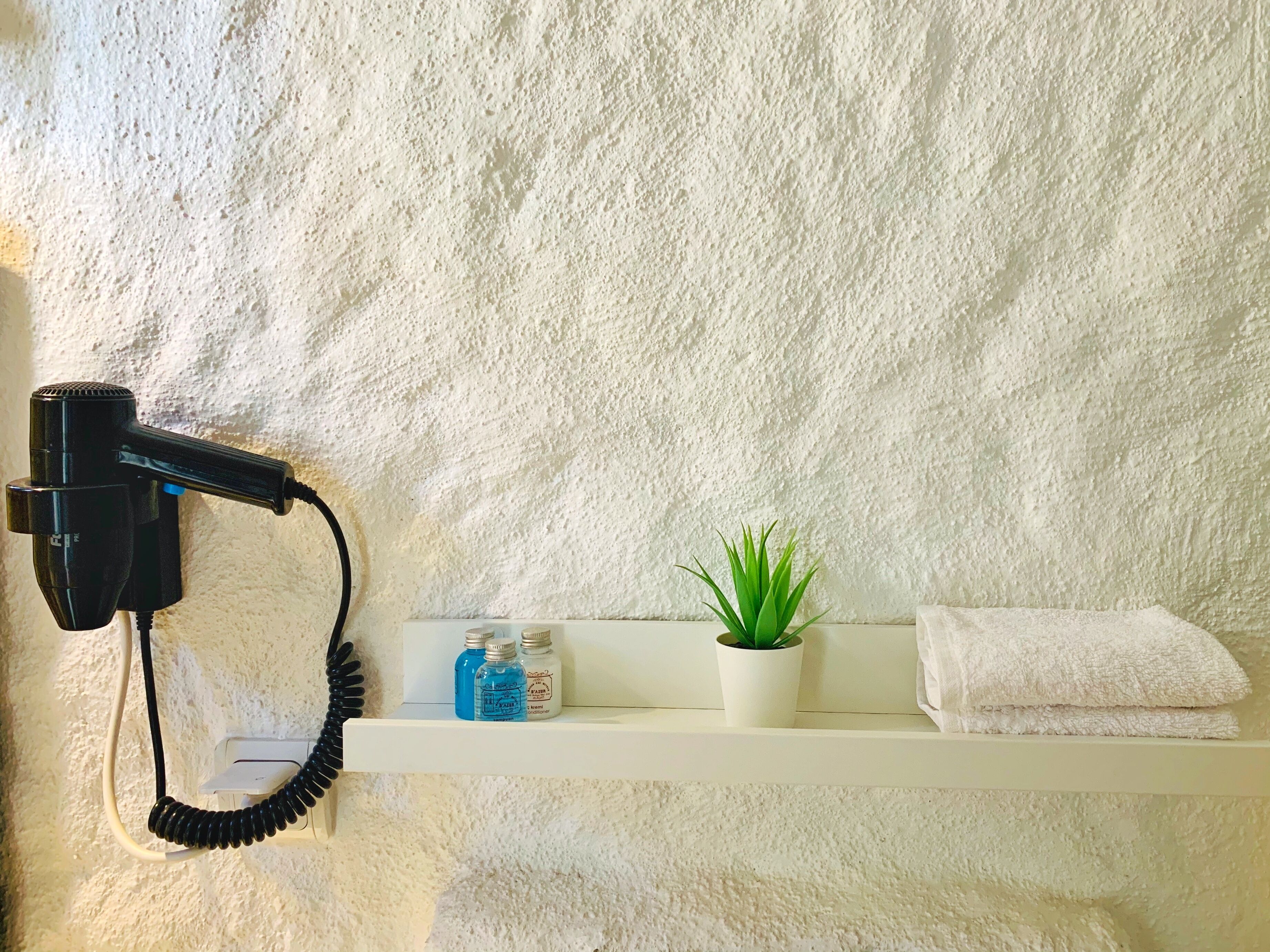 shower, free toiletries, hair dryer, slippers