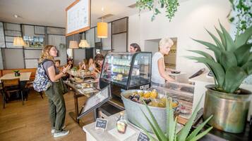 Daily self-serve breakfast (EUR 8.5 per person)