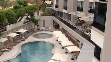 Indoor pool, outdoor pool, pool umbrellas, sun loungers