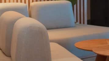 A modern living room with a sofa and a coffee table.