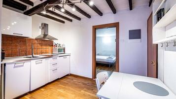 Apartment, 1 Bedroom (Via dell'Orto 8) | Private kitchen | Fridge, microwave, stovetop, dishwasher