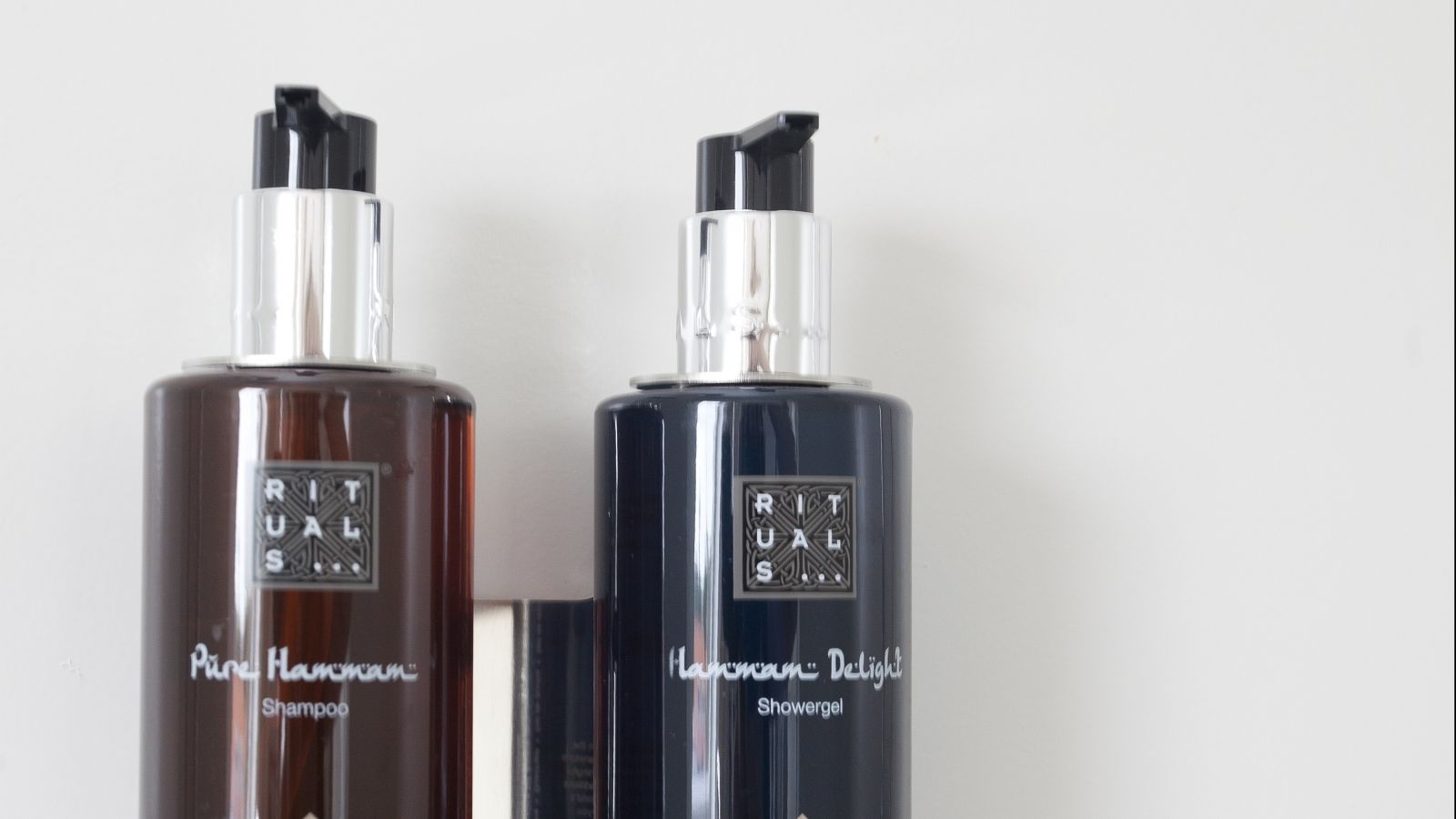 rainfall showerhead, designer toiletries, hair dryer, towels