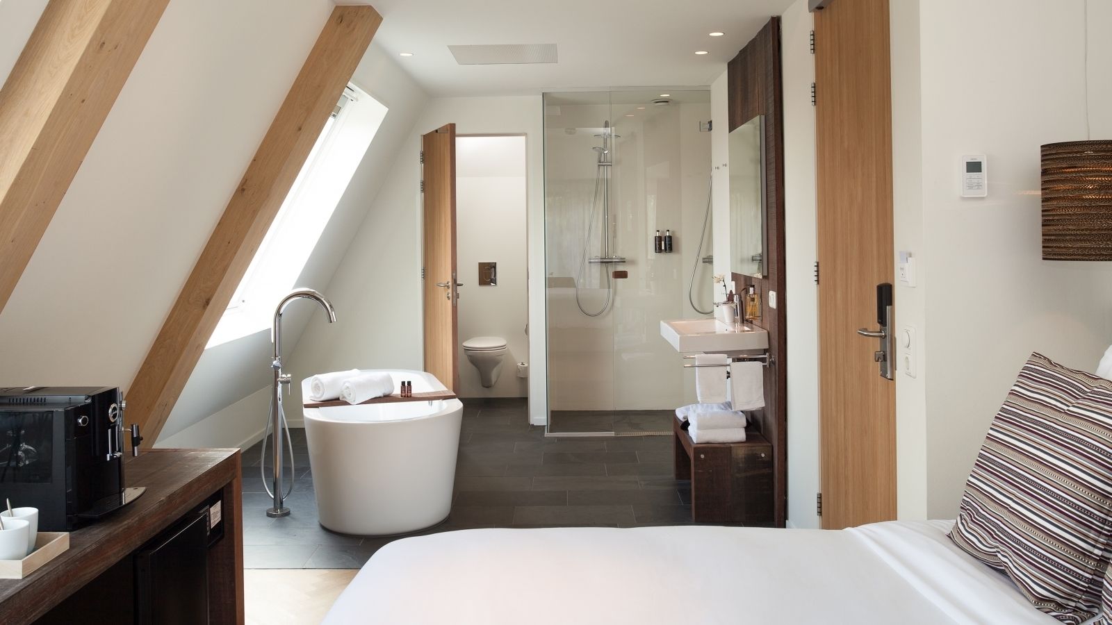 junior suite | 1 bedroom, minibar, in-room safe, blackout curtains