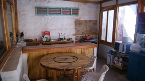 Standard Double Room, 1 Double Bed, Private Bathroom | Shared kitchen | Fridge, microwave - Hostal Barros Nativo (San Pedro de Atacama)