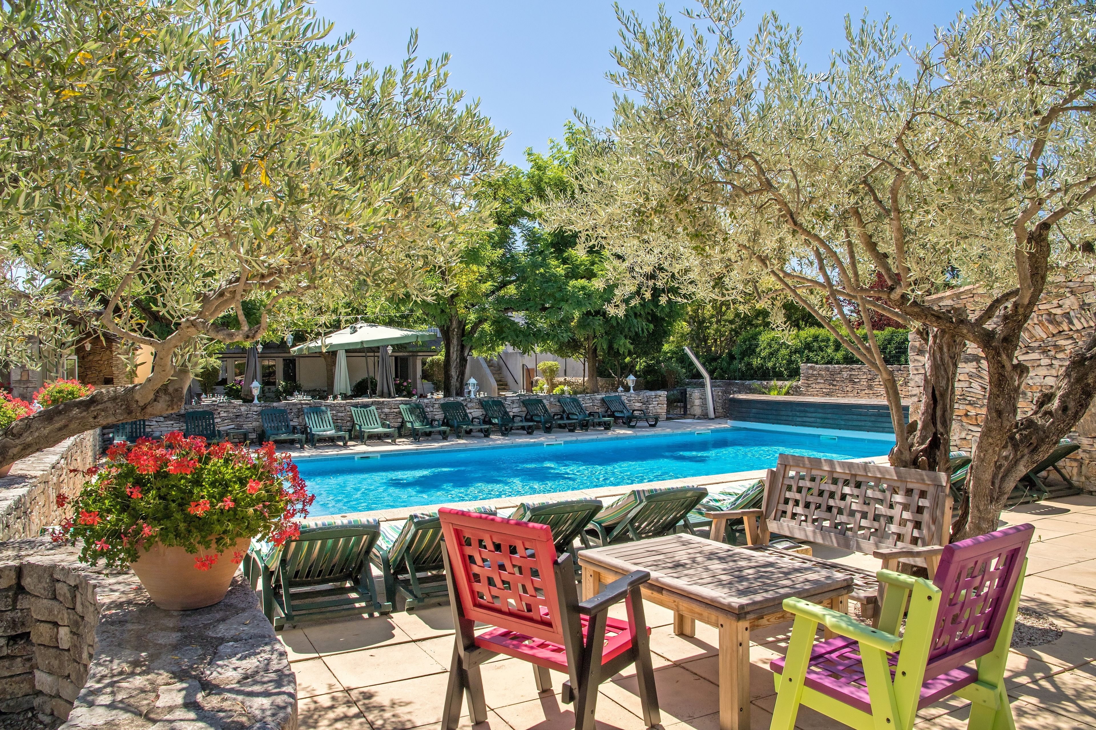 outdoor pool, pool umbrellas, pool loungers