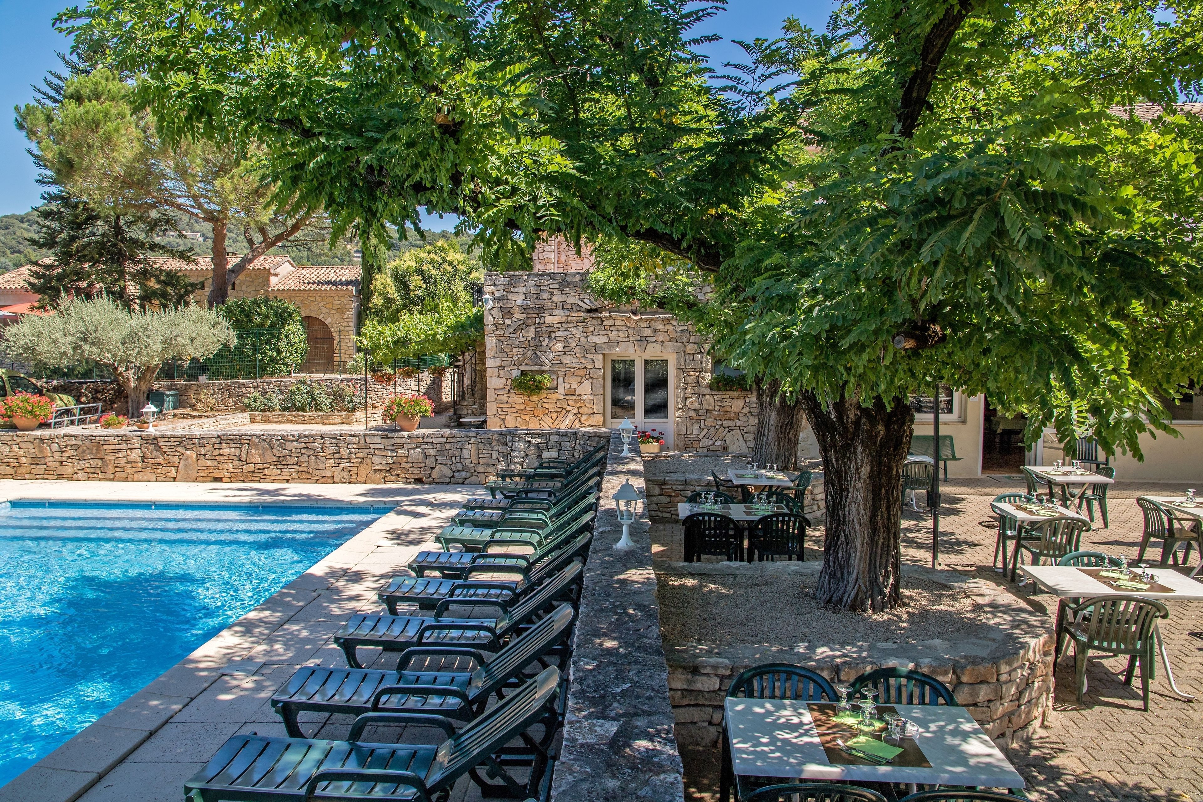 outdoor pool, pool umbrellas, pool loungers