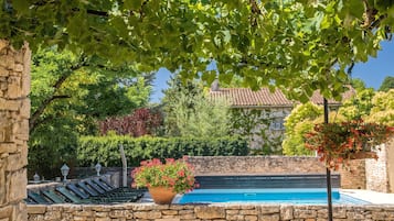 Outdoor pool, pool umbrellas, sun loungers