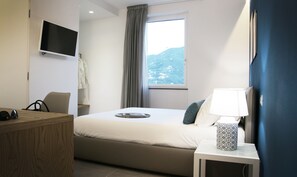 Basic Double Room (Blu) | Premium bedding, desk, rollaway beds, free WiFi