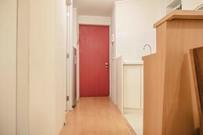 Standard Apartment | Living area | Flat-screen TV - J.V. Lastarria Apartments (Santiago)
