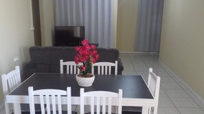 Apartment | Living room | LCD TV - Apartamento Osmar Gaya - Navegantes (Navegantes)