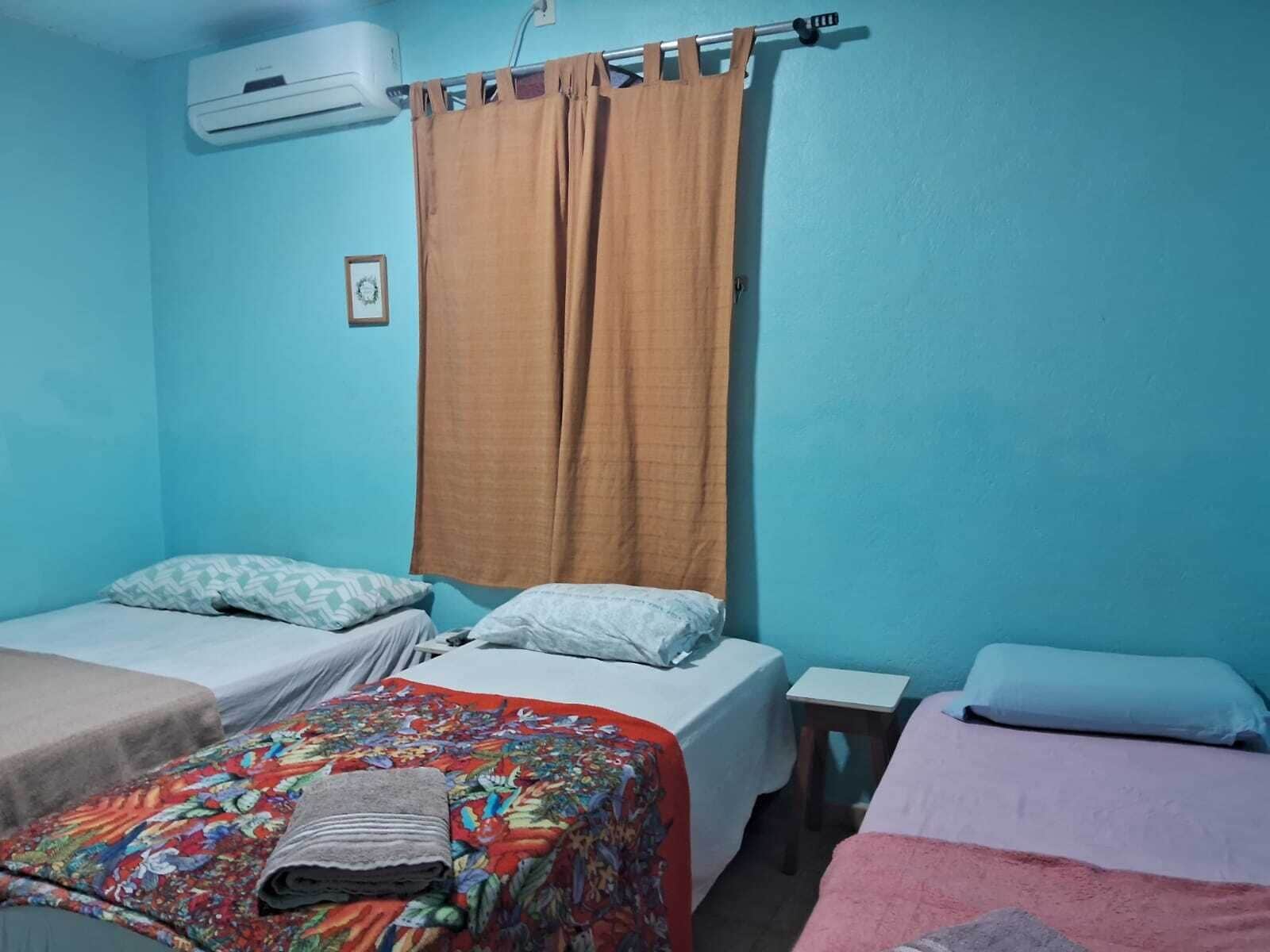 economy suite | minibar, desk, blackout curtains, iron/ironing board