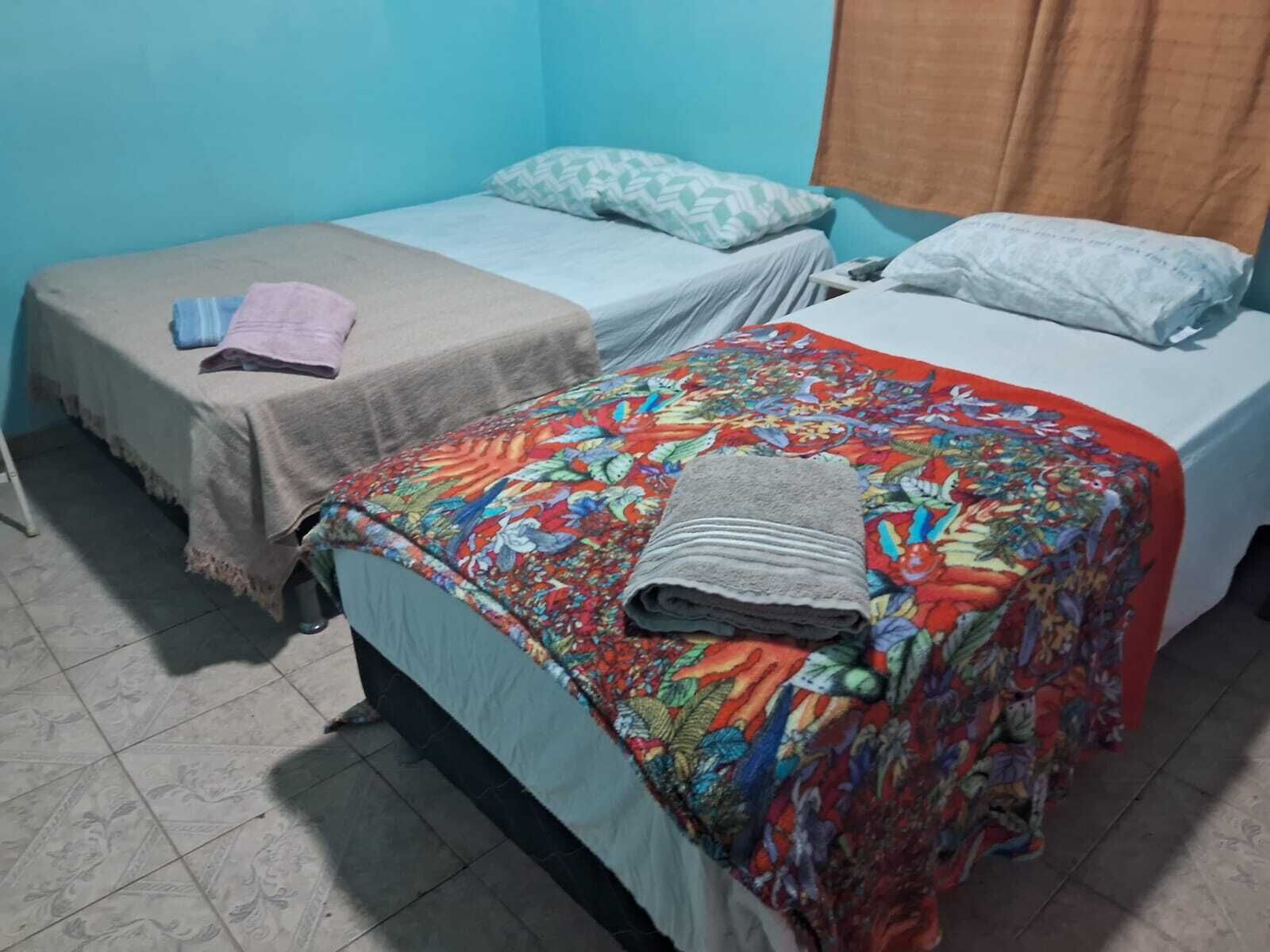 economy suite | minibar, desk, blackout curtains, iron/ironing board