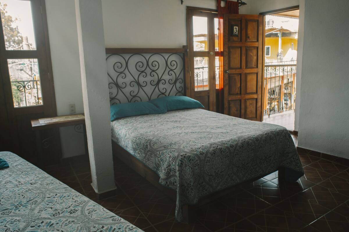traditional room, 2 double beds | laptop workspace, iron/ironing board, free wifi, bed sheets