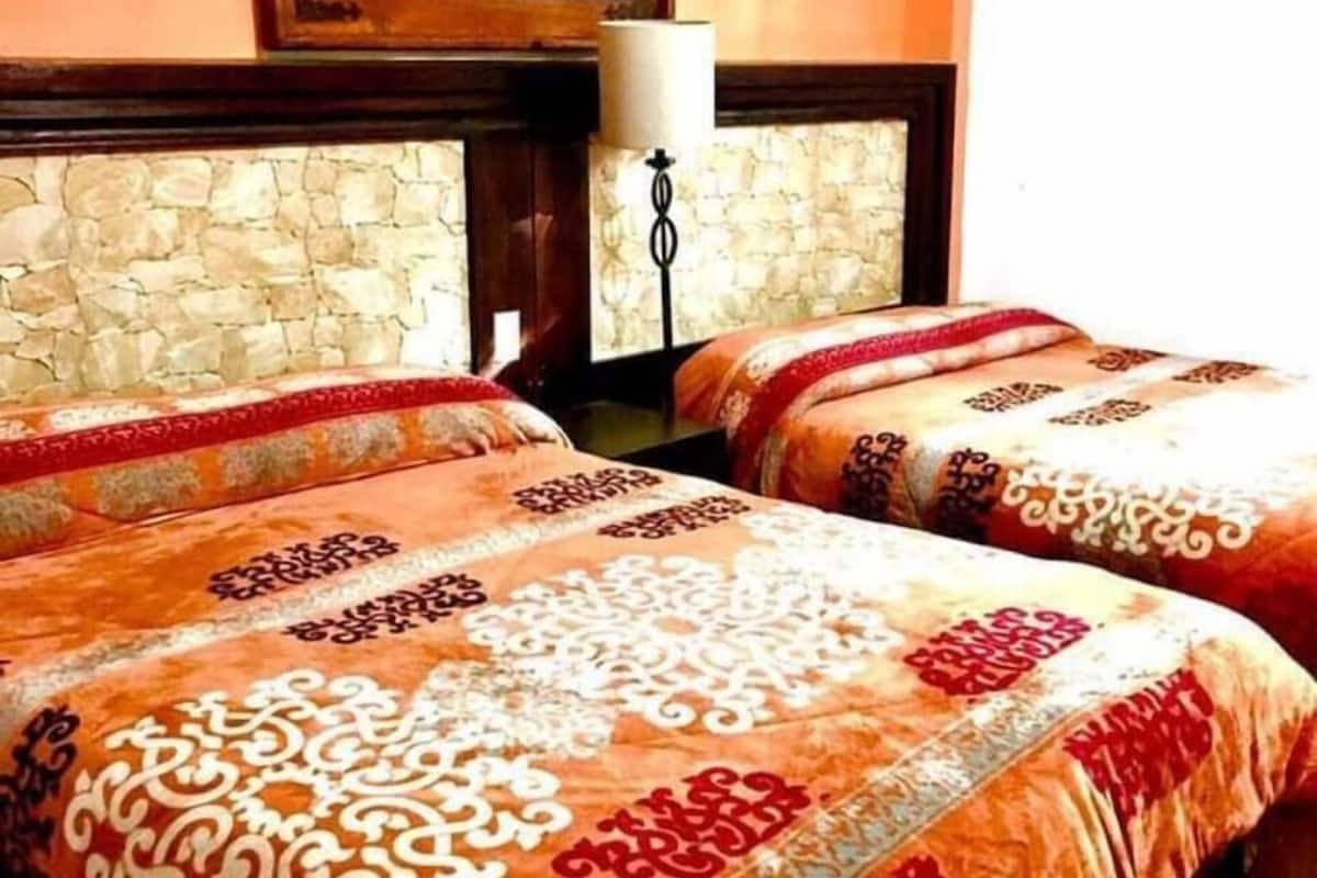 traditional room, 2 double beds | laptop workspace, iron/ironing board, free wifi, bed sheets