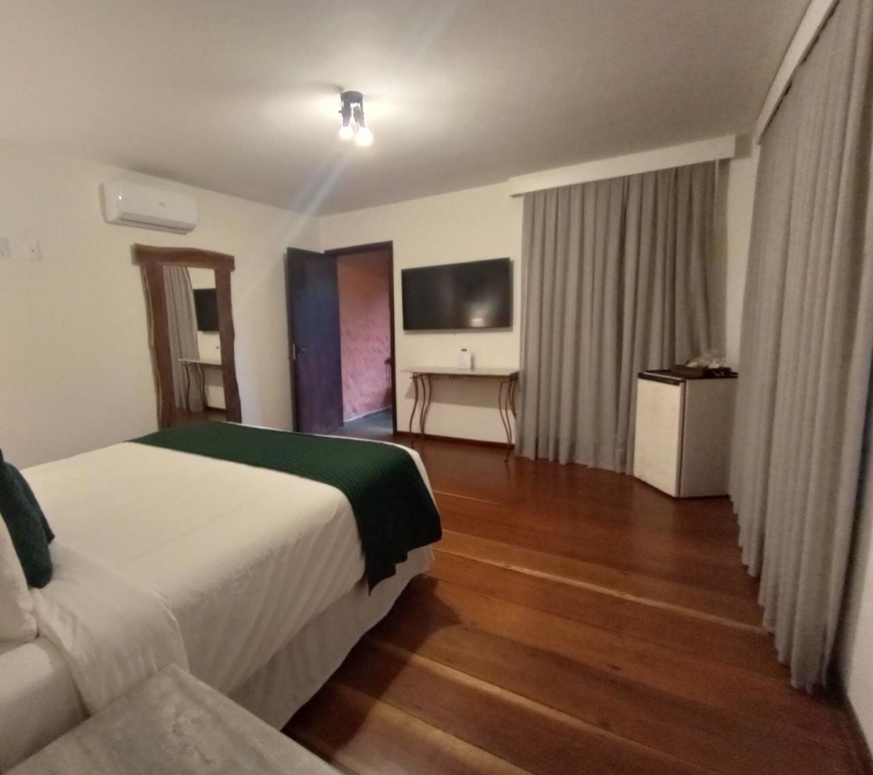 Minibar, blackout curtains, bed sheets