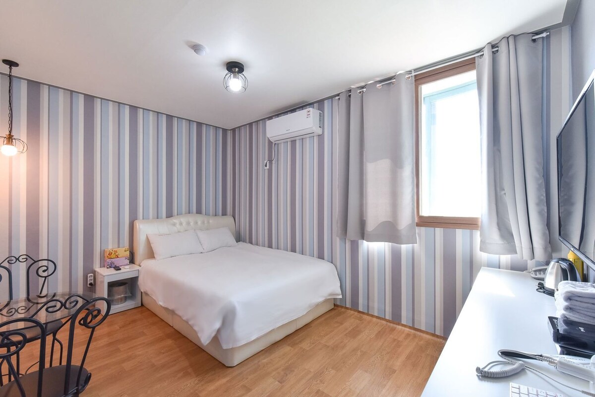 Blackout drapes, iron/ironing board, WiFi (free), bed sheets