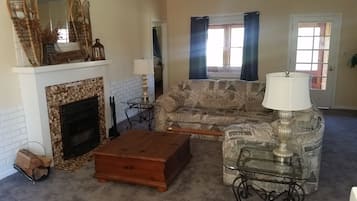 TV, fireplace, books