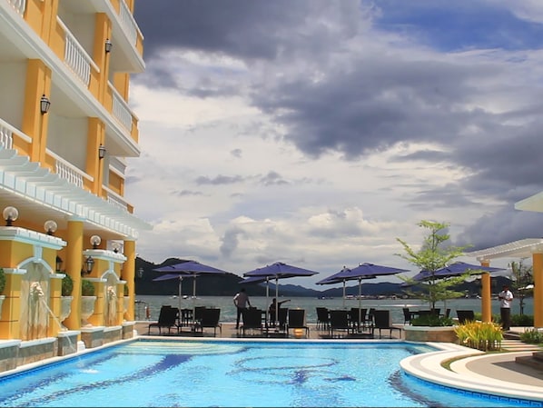 Outdoor pool, pool umbrellas, pool loungers