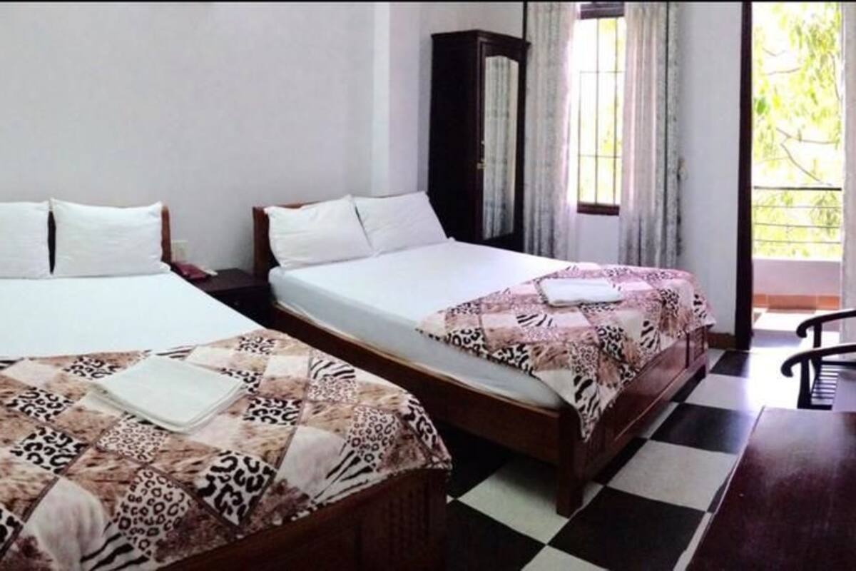 Habitación cuádruple clásica, balcón | Minibar, escritorio, wifi gratis
