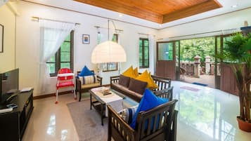 2 Bedroom Pool Villa | Living room | Flat-screen TV