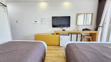 Habitación Deluxe con 2 camas individuales | Cortinas opacas y wifi gratis