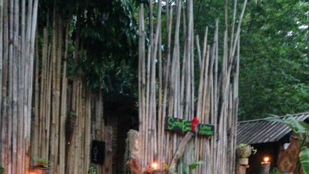 A rustic wooden structure with a sign reading "Southeast".