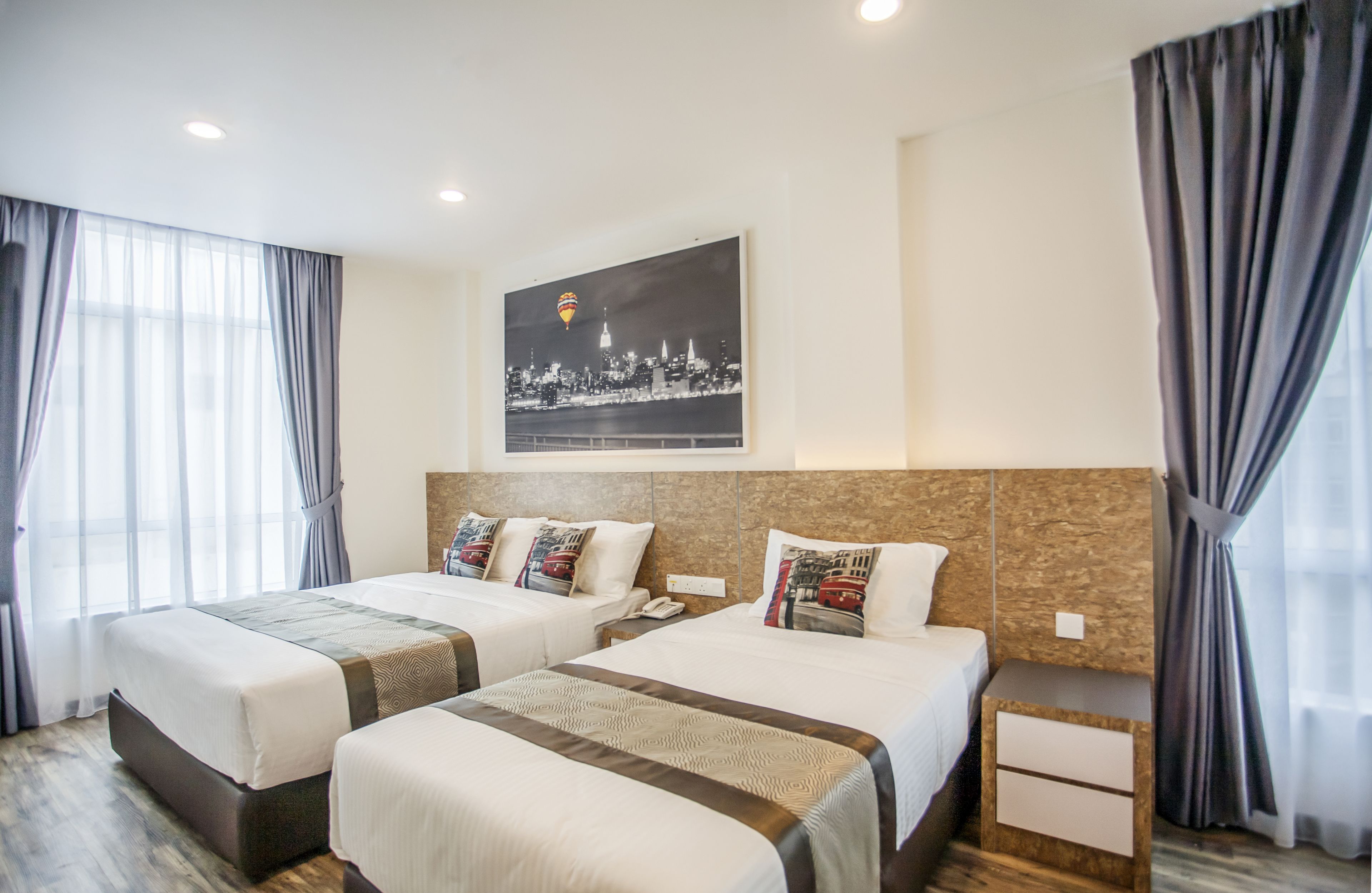 deluxe triple room | premium bedding, iron/ironing board, free wifi, bed sheets
