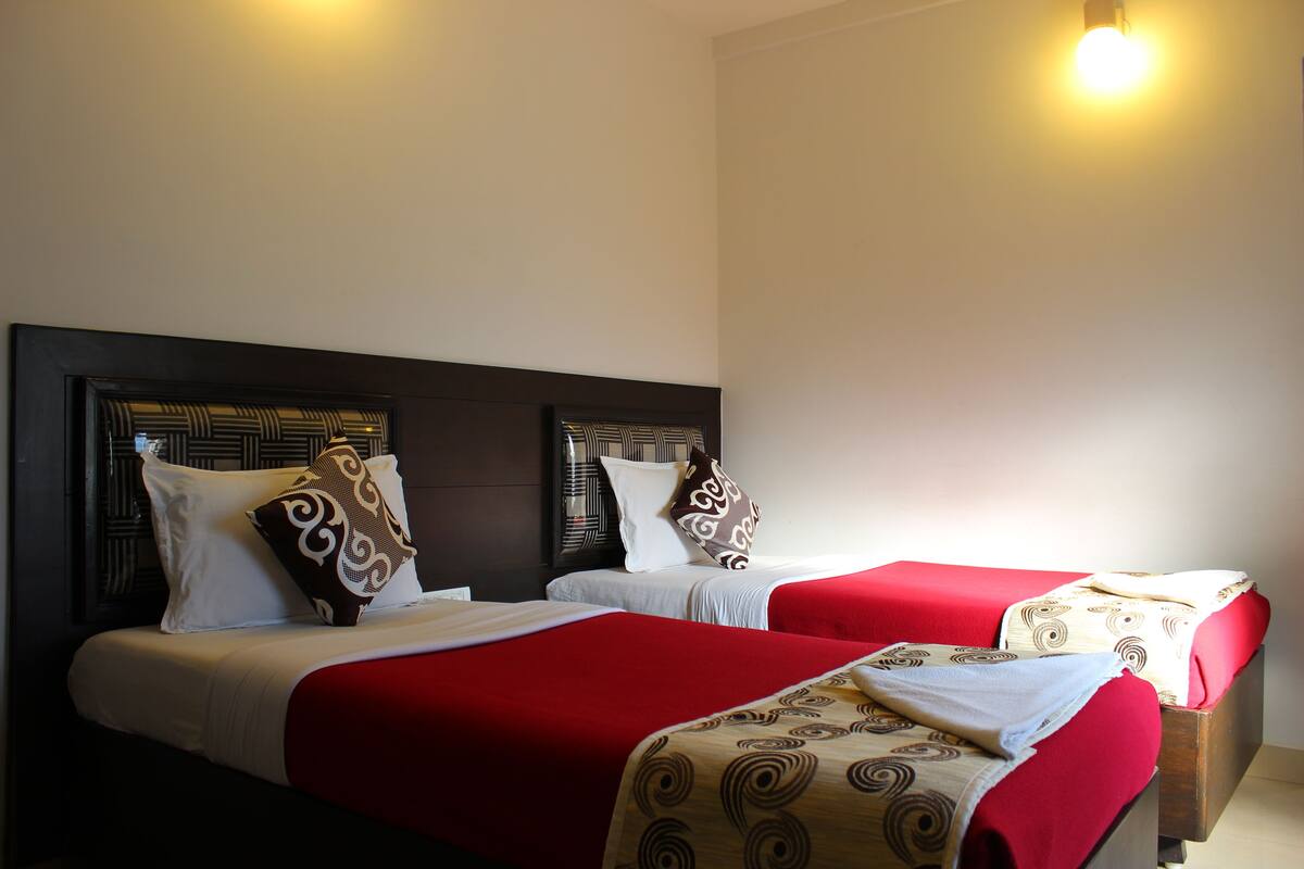 Family Suite, 1 Bedroom | Desk, iron/ironing board, rollaway beds, free WiFi