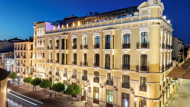 A historic building with multiple balconies and a clock tower, likely a hotel. - Catalonia Ronda (Ronda)