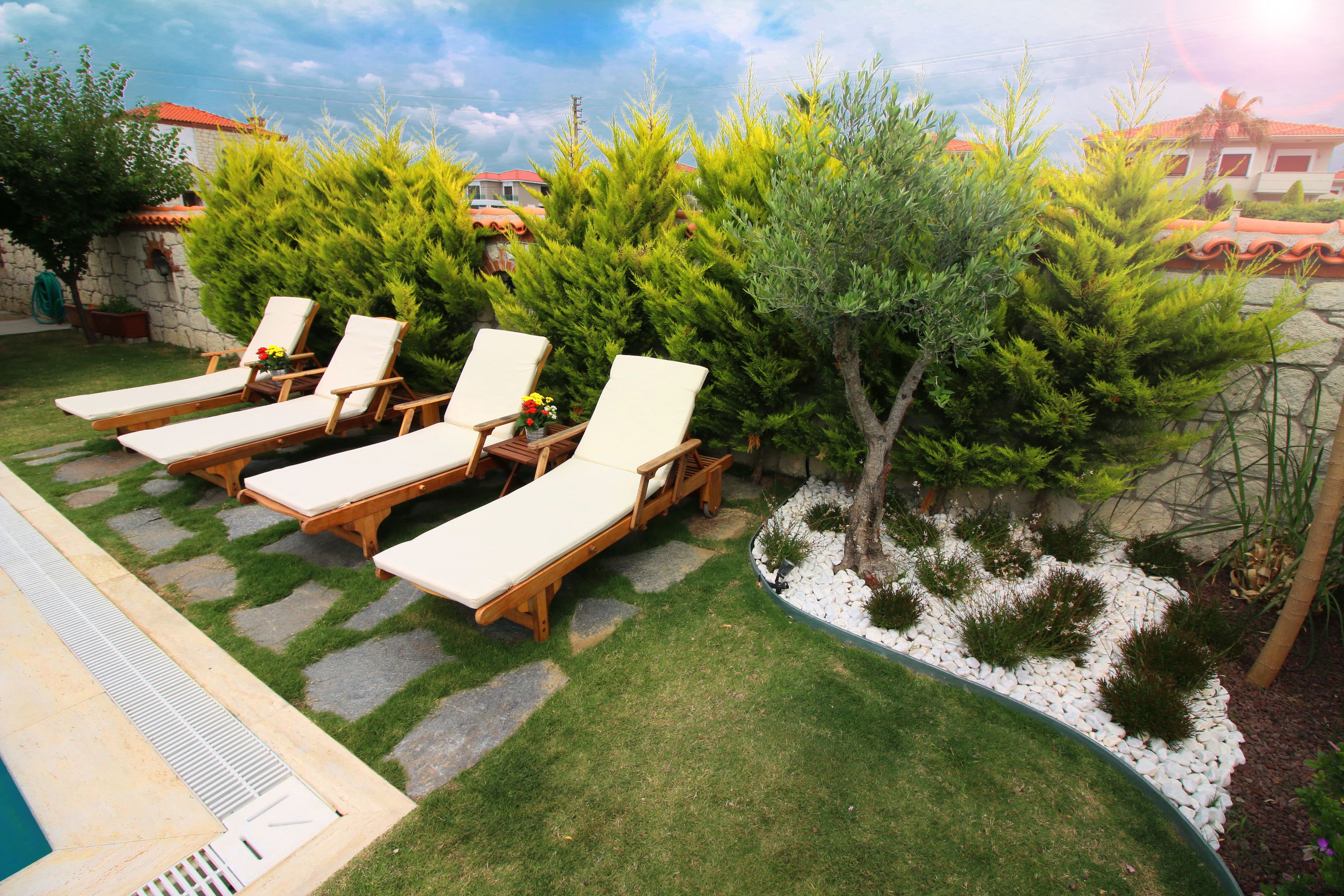 outdoor pool, pool umbrellas, pool loungers