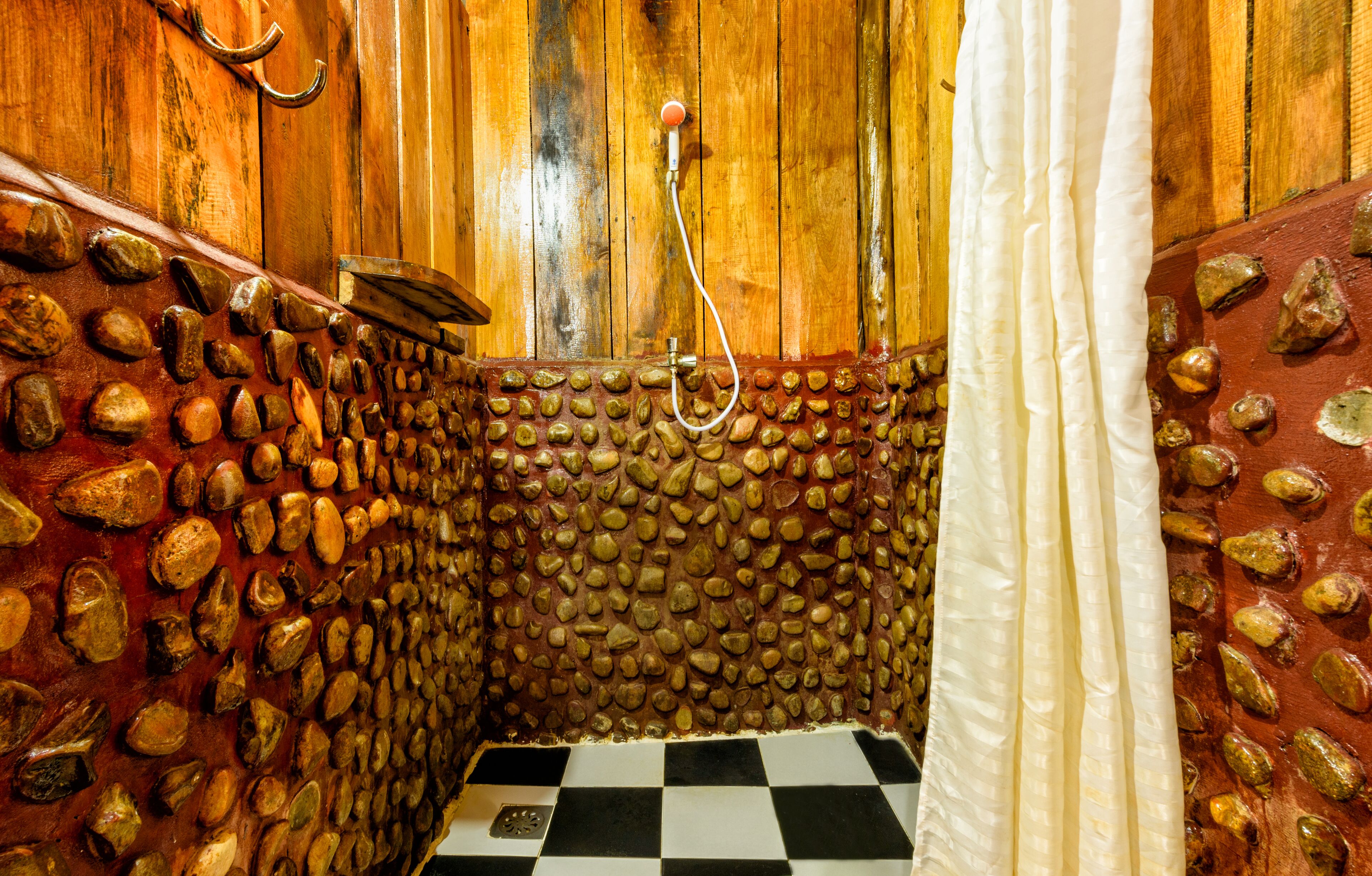 beachfront bungalow with fan | bathroom | shower, free toiletries, towels