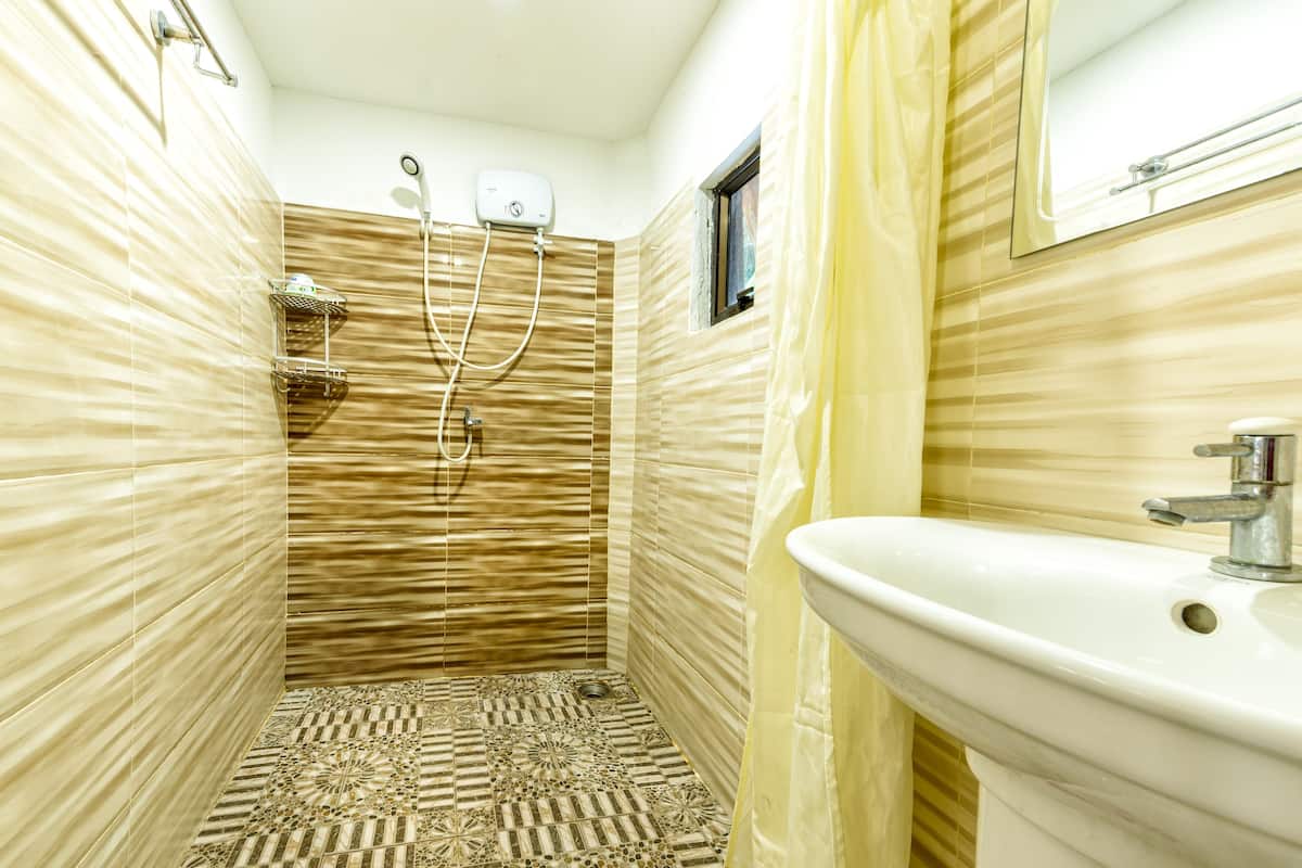 ac beach front bungalow | bathroom | shower, free toiletries, towels