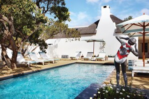 Outdoor pool, sun loungers