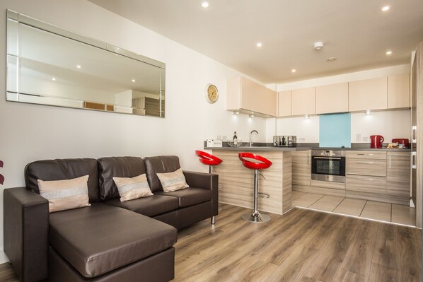 Apartment, 2 Bedrooms | Living area | Flat-screen TV, DVD player