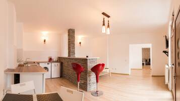 City Apartment, 2 Bedrooms, Balcony | Living area | 38-inch flat-screen TV with cable channels, TV